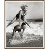 Young Couple Playing Leapfrog in the Surf