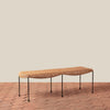 Lacoste Indoor/Outdoor Bench — sustainably harvested rattan and iron, coastal entryway and porch bench