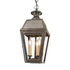 Traditional English brass lantern pendant light with glass panels and candle-style bulbs
