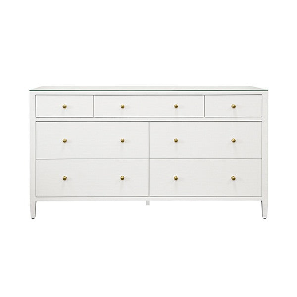 Carnegie seven drawer chest in snow white linen with brass knobs and glass top