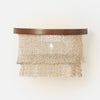 Handwoven coco bead wall sconce with layered fringe detail, damp rated bathroom vanity lighting in warm bronze finish